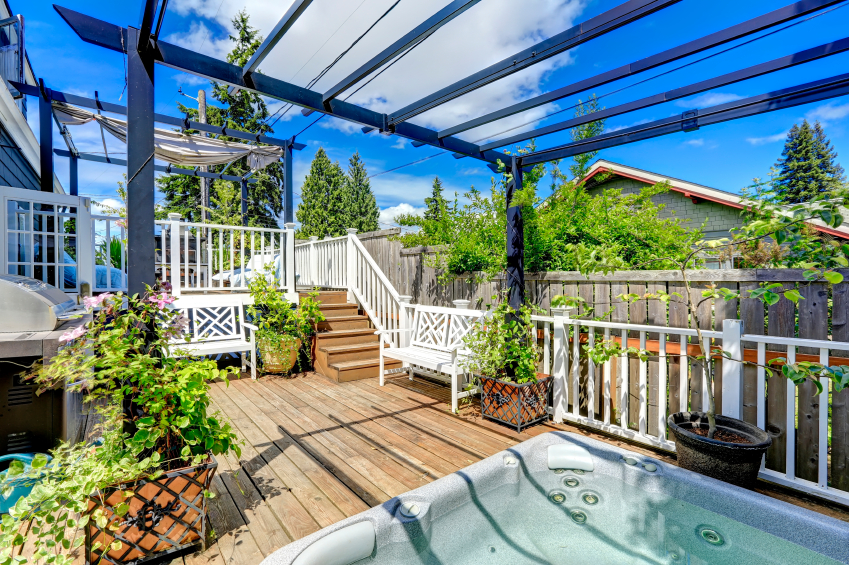 Walkout deck with jacuzzi and pergola